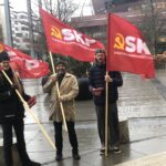 Partifanor med ny logo lyste upp i ruskvädret i Malmö.