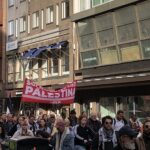 SKP:s banderoll i demonstrationen.